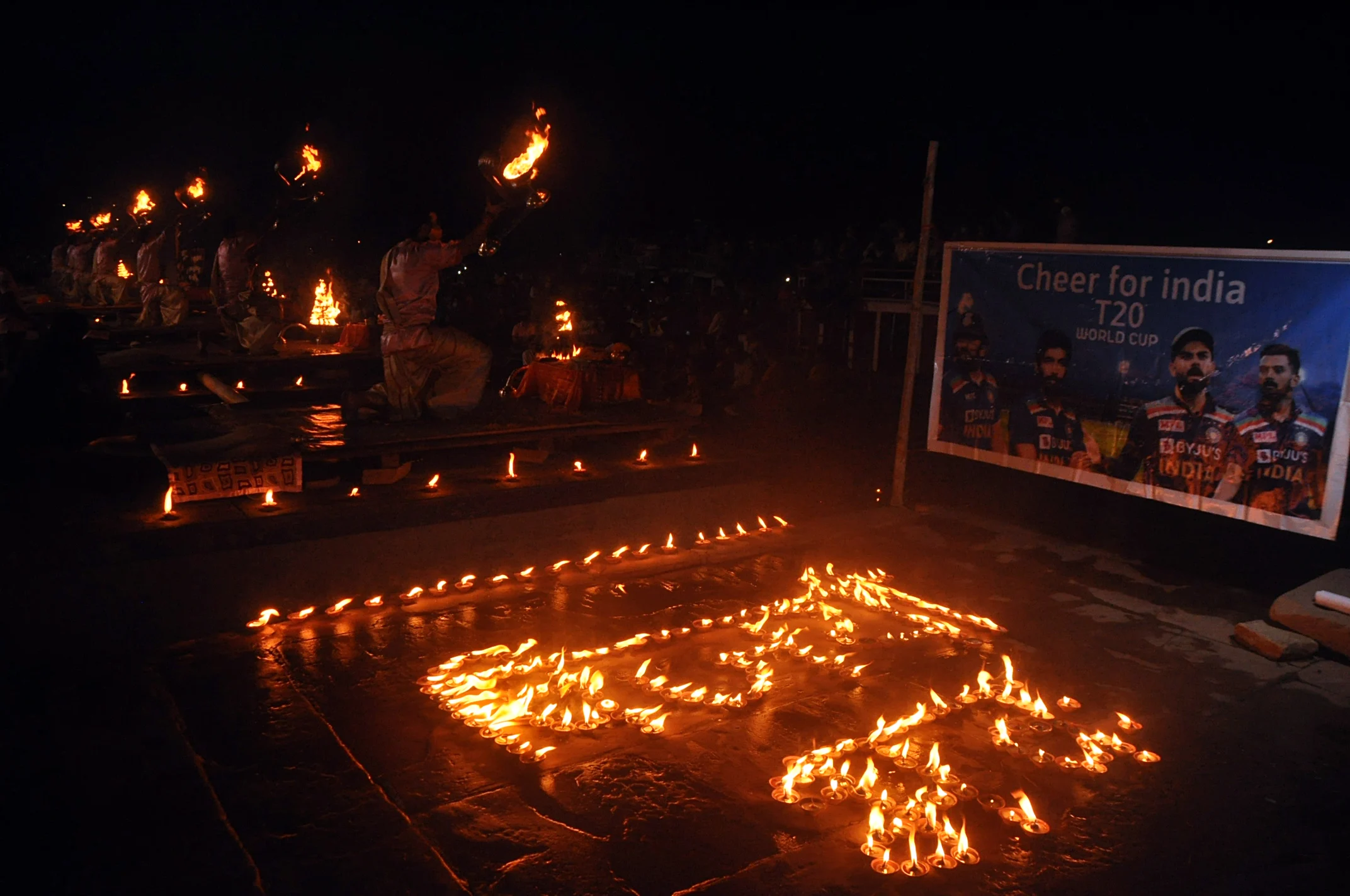 Priests perform Maha Aarti in support of the Indian mens cricket team on the eve of the ICC T20 World Cup match between India vs Pakistan, in Varanasi on Saturday.