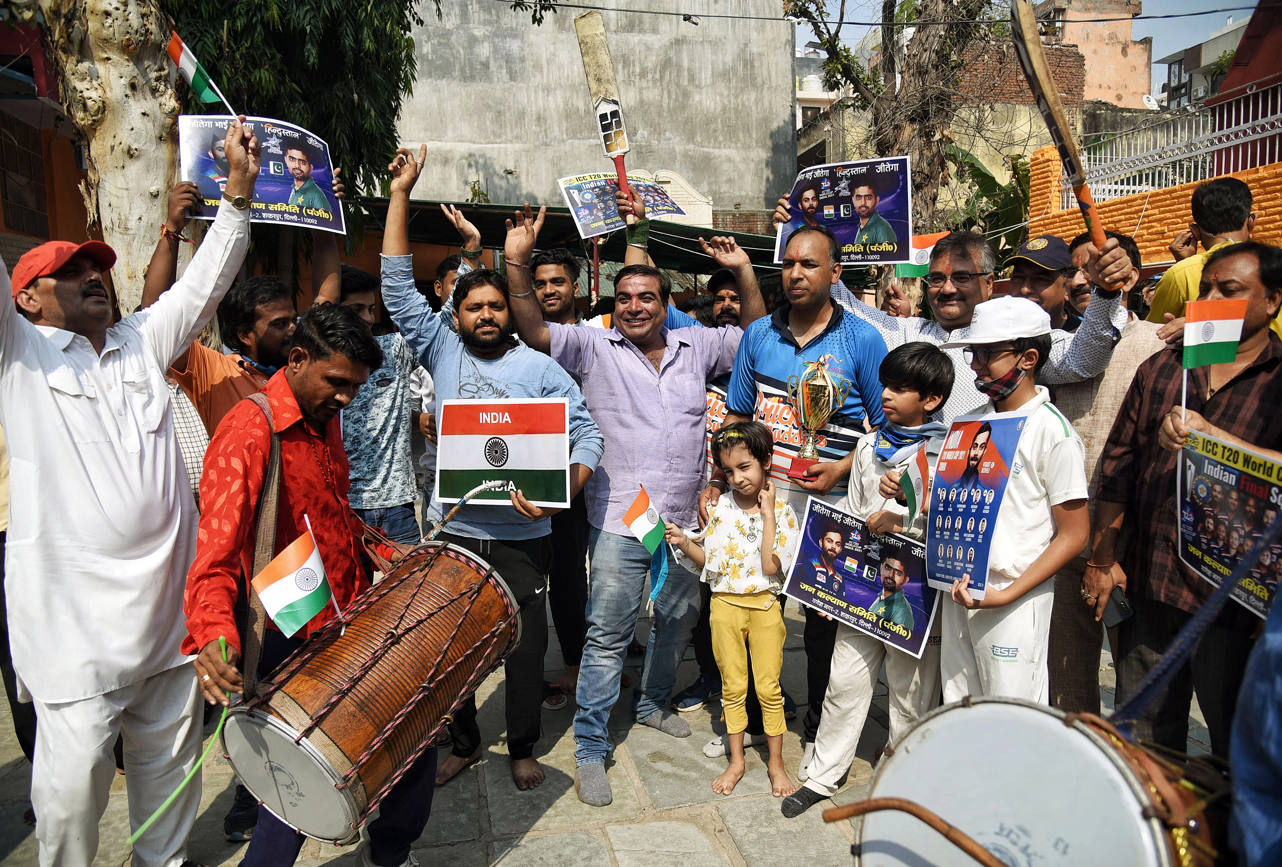 Cricket fans dancing ahead of ICC Mens T20 World Cup 2021 match between India and Pakistan, in New Delhi on Sunday.