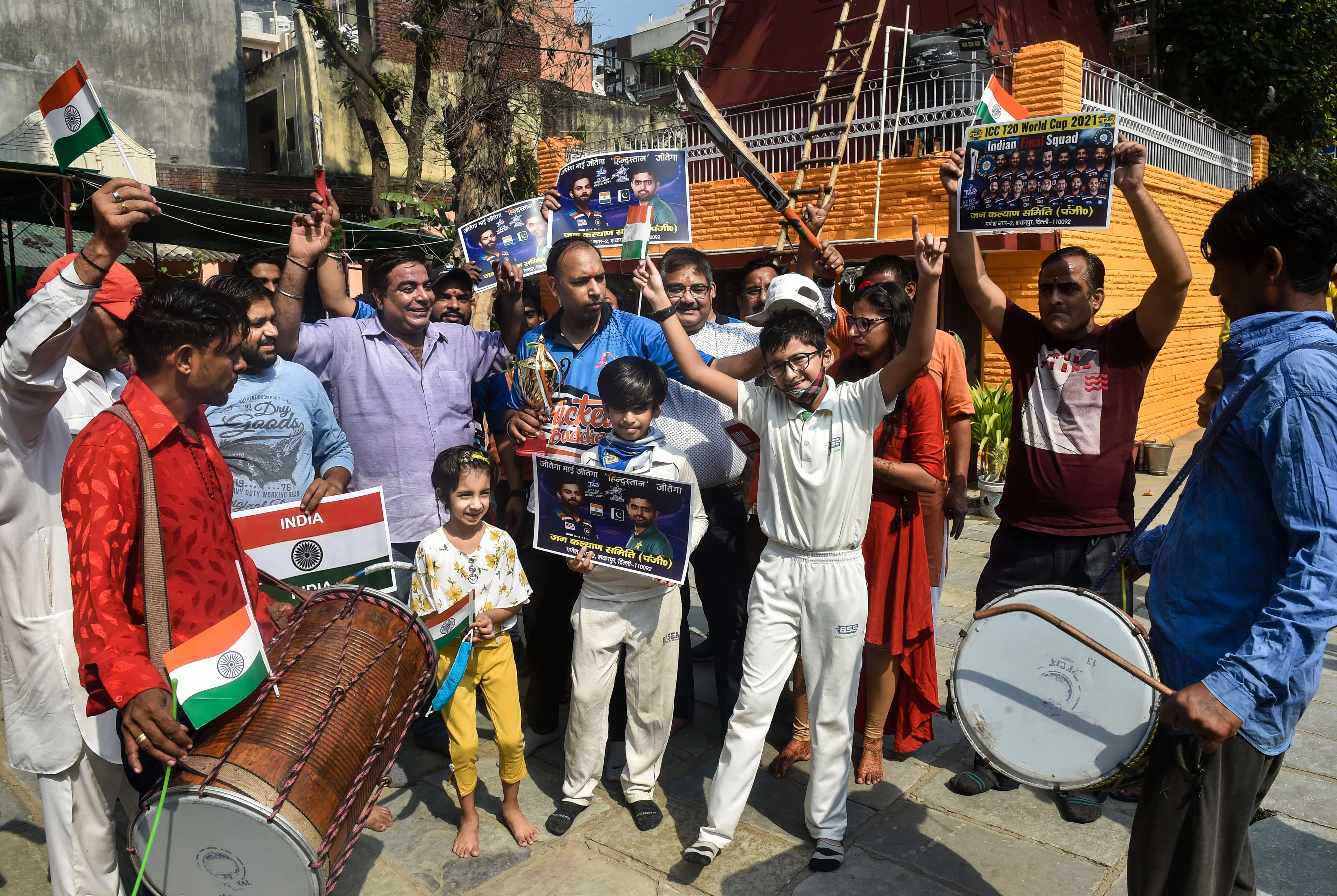 Cricket fans cheer for Team India ahead of the India vs Pakistan ICC Mens T20 World Cup match in Dubai, while organising a yagya for the victory of Team India, at Ganesh Nagar in East Delhi, Sunday, Oct. 24, 2021.