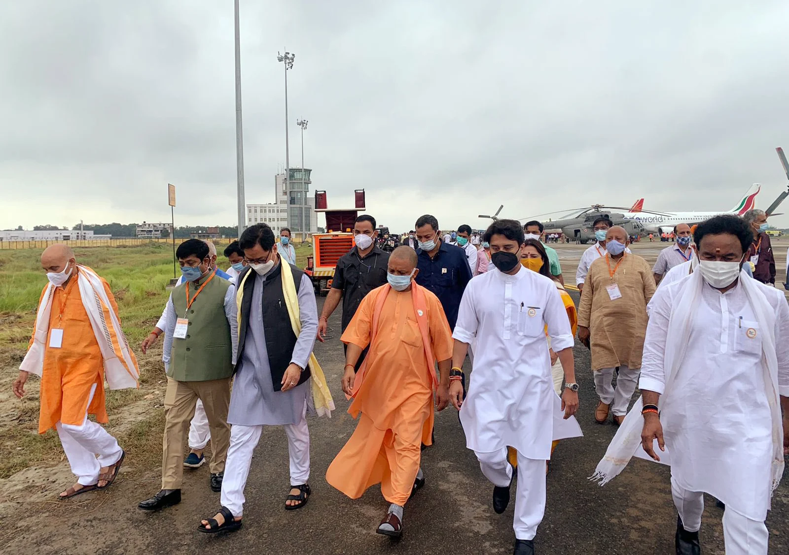 Union Minister of Civil Aviation Jyotiraditya Scindia, Uttar Pradesh Chief Minister Yogi Adityanath and other dignitaries arrive to attend the inauguration of the Kushinagar International Airport by Prime Minister Narendra Modi, in Kushinagar on Wednesday.