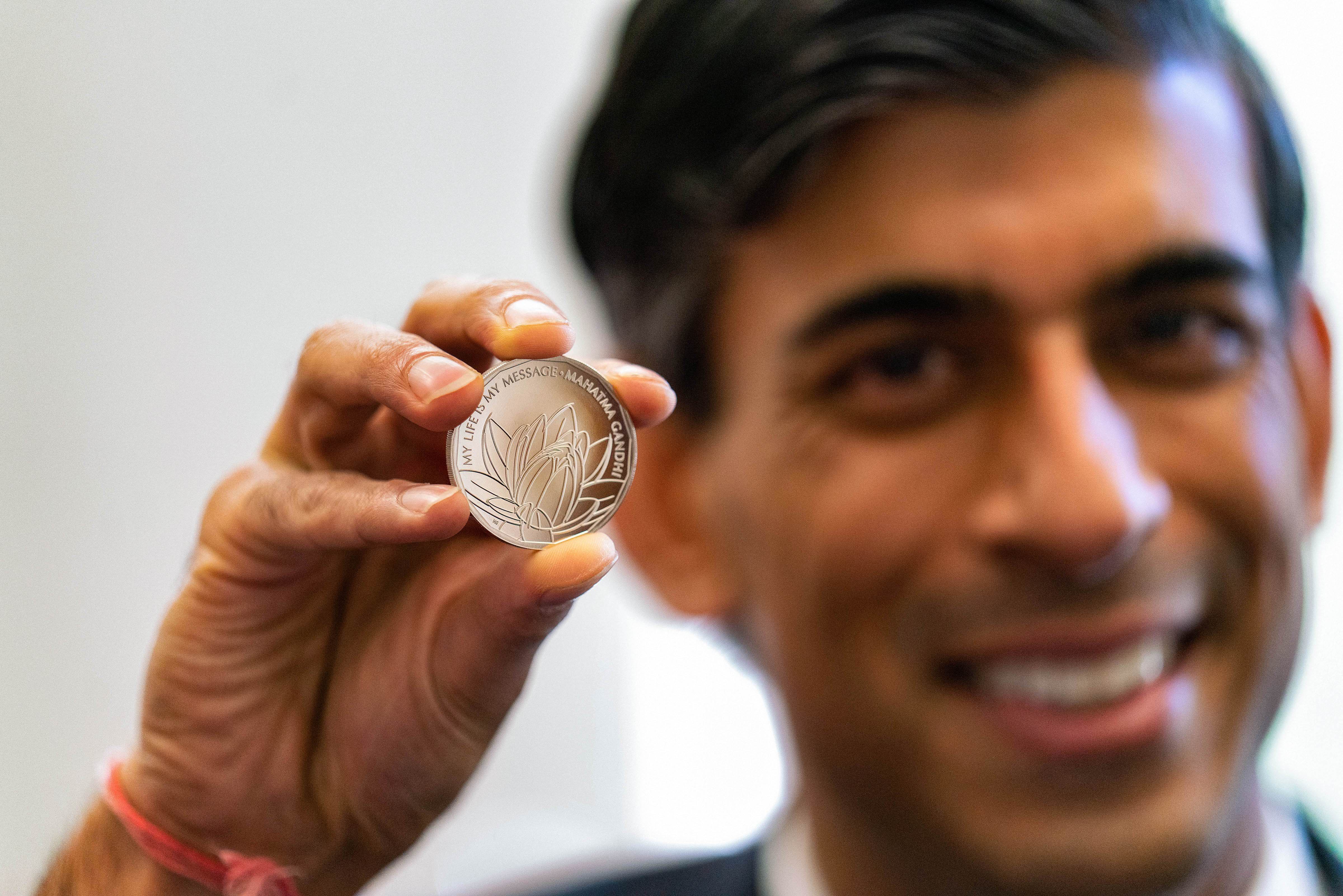 On Diwali, UK minister Rishi Sunak releases new commemorative Â£5 coin to celebrate life and legacy of Mahatma Gandhi - Vimarsana News