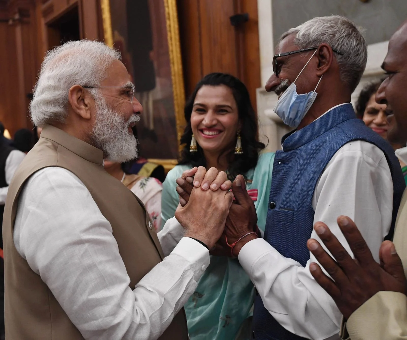 Prime Minister Narendra Modi interacts with the awardees during the Padma Shri Awards at Rashtrapati Bhavan, earlier today.
