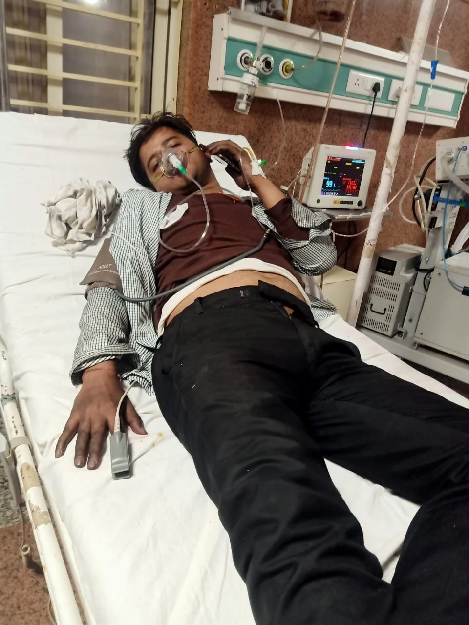 Ratnesh Tiwari admitted to Hamidia Hospital after he fainted while rescuing children from the dark, smoke-filled SNCU on November 8.