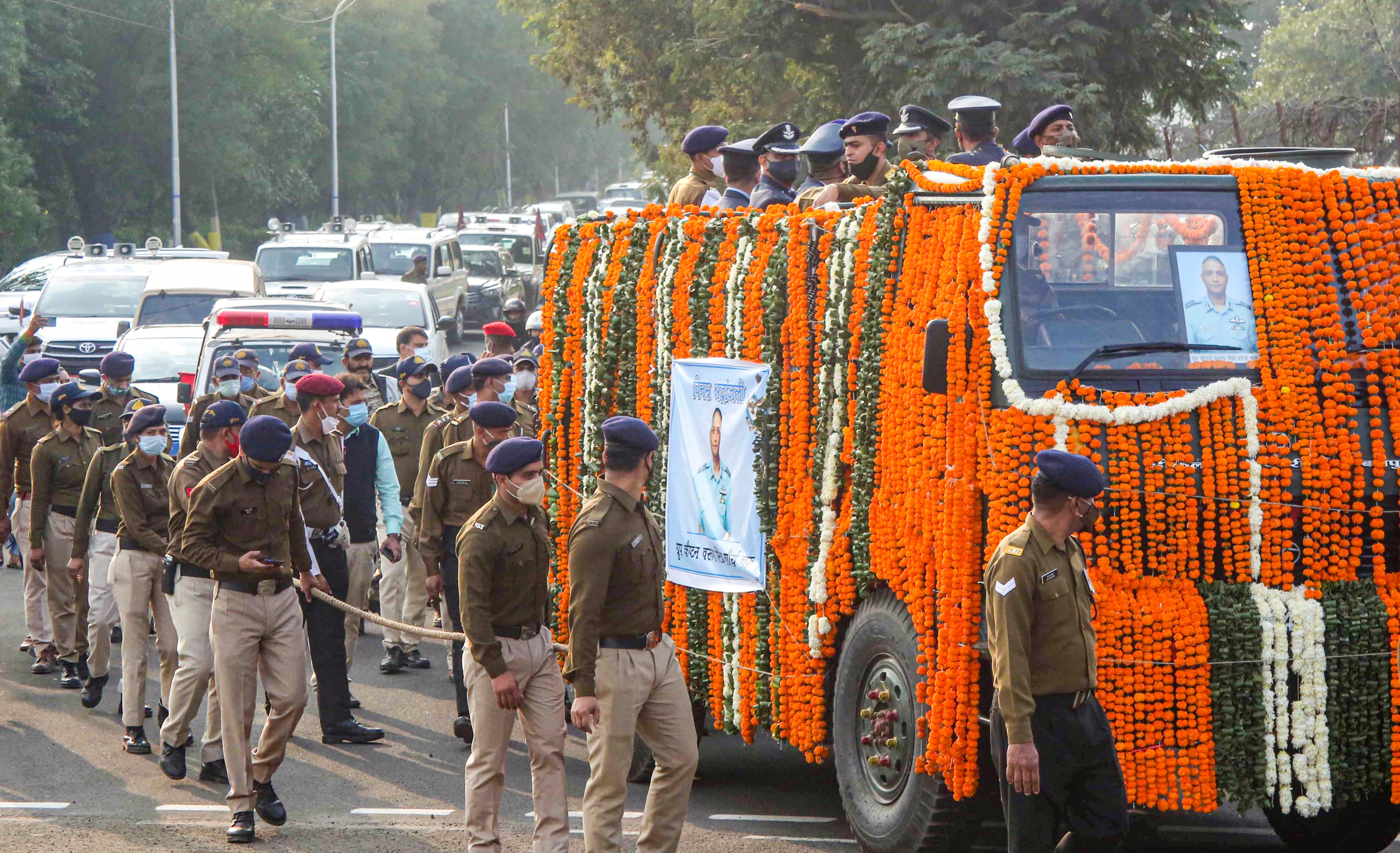 Bhopal: Army personnel carry the mortal remains of Group Captain Varun Singh near his residence in Bhopal, Thursday
