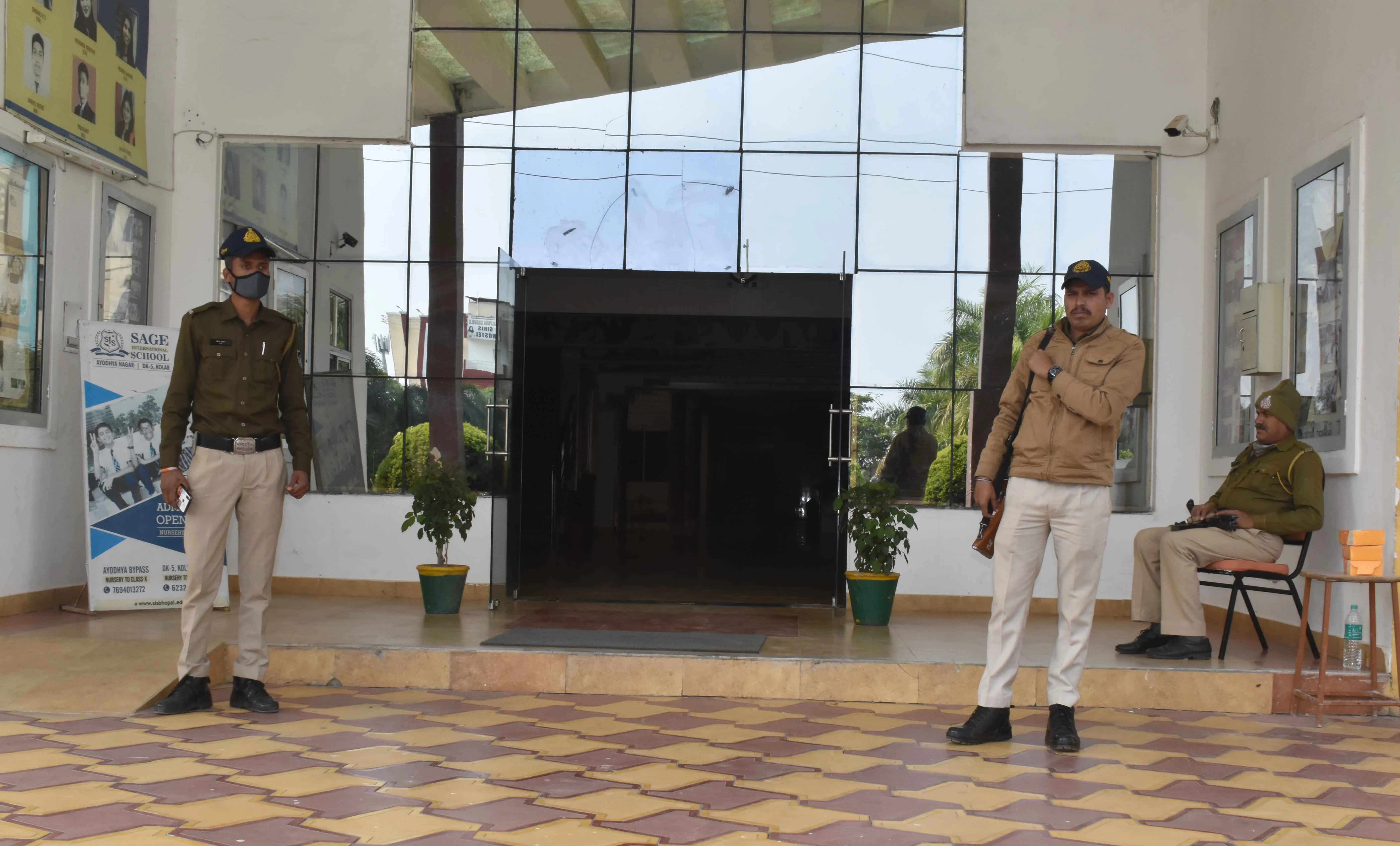 Cops at Sage Group office during I-T raids in Bhopal