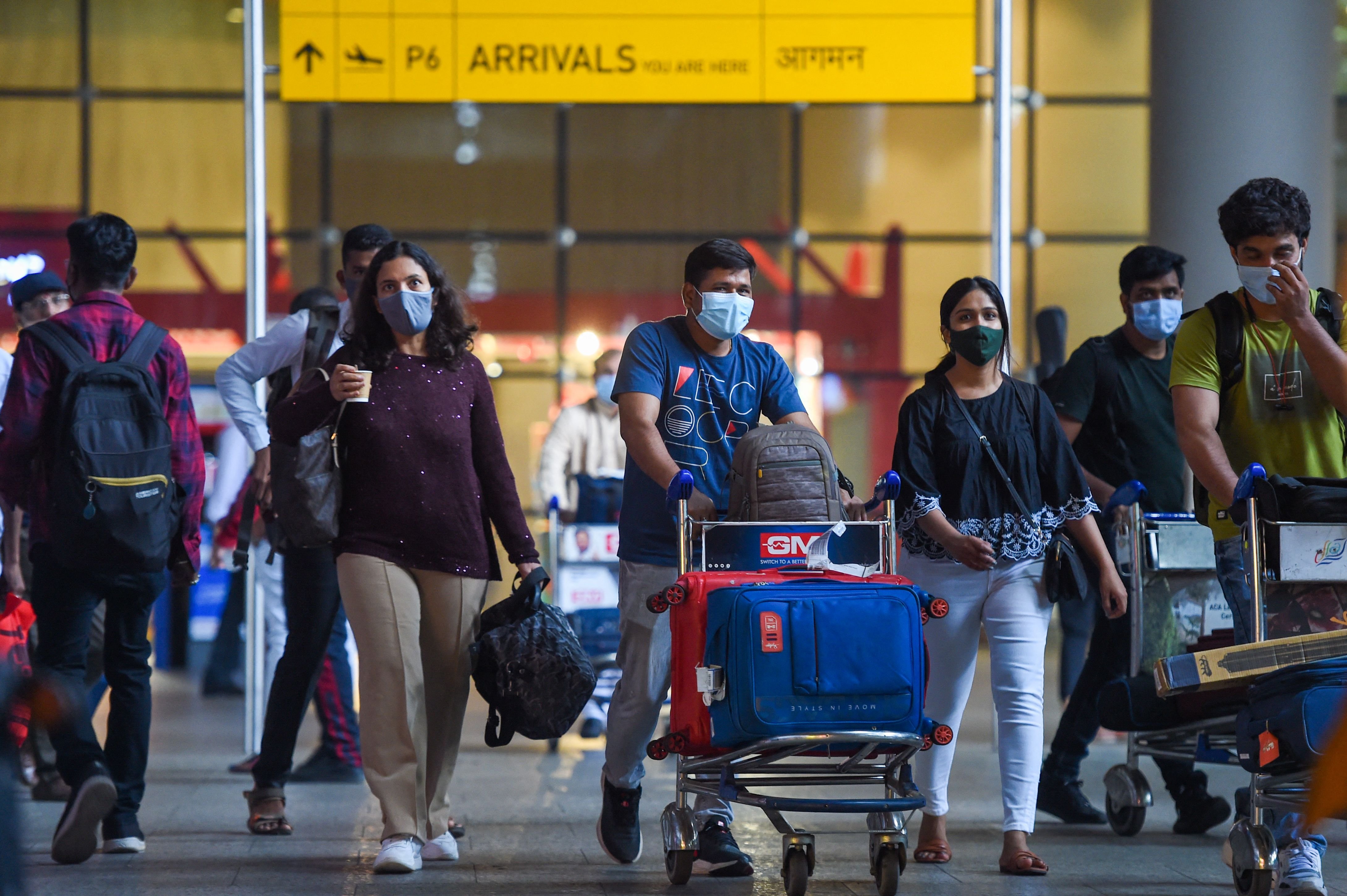 Omicron scare in Madhya Pradesh: Mandatory airport tests for passengers on Dubai flight - Vimarsana News