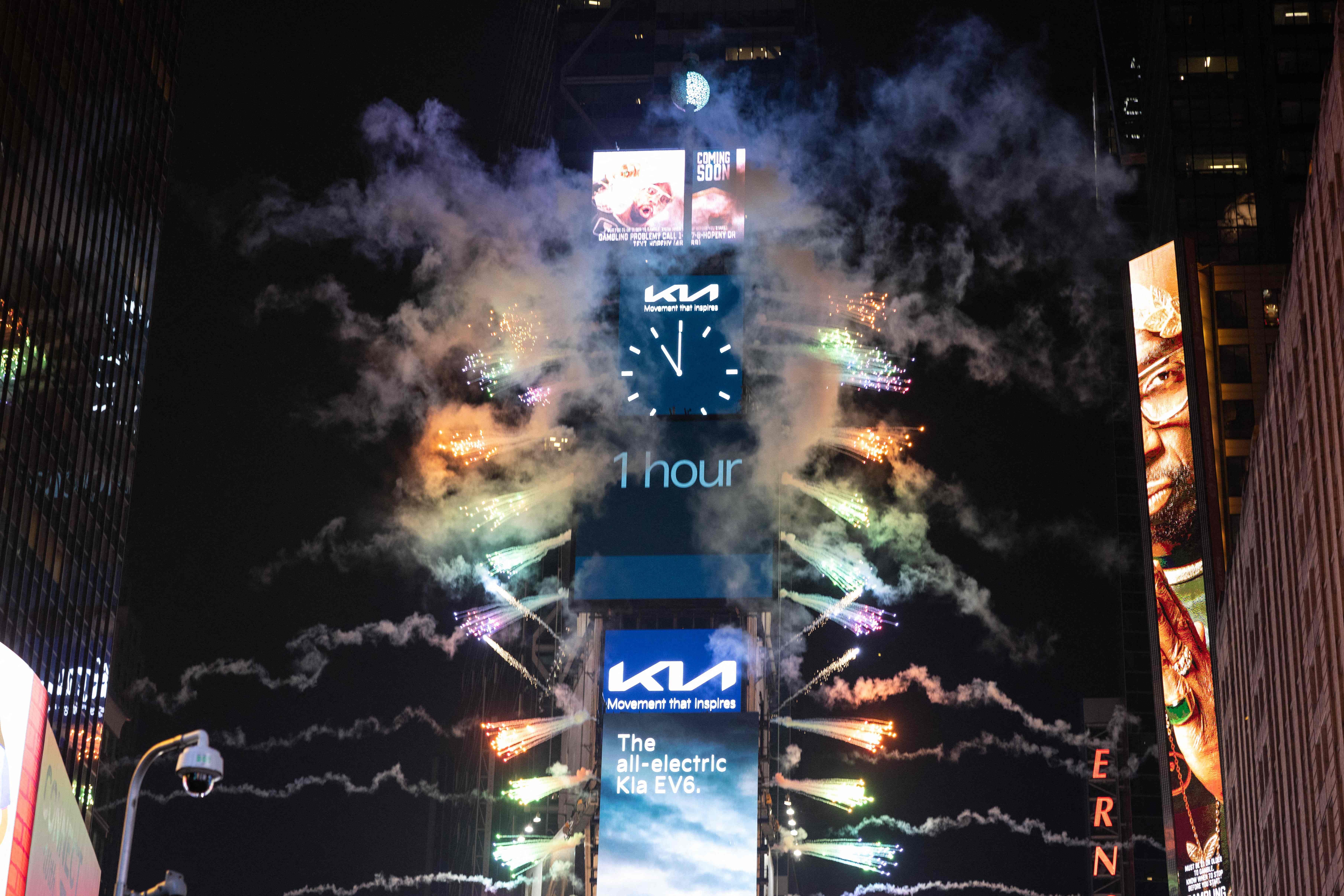 Fireworks go off one hour before midnight during New Years Eve celebrations at Times Square in New York City on December 31, 2021.