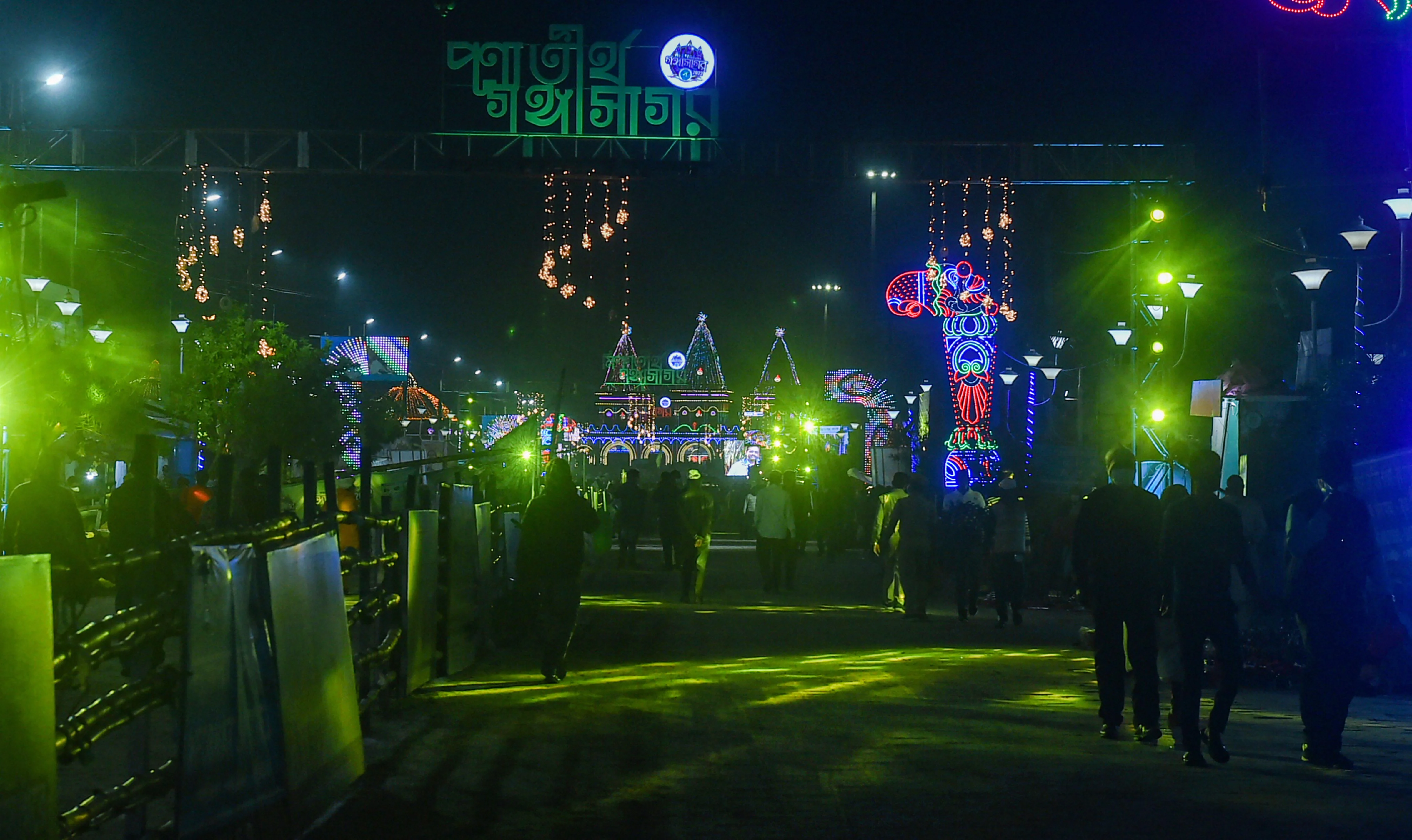 South 24 Parganas: Illuminated Gangasagar Mela on the eve of Makarsankrati at Sagar Island in South 24 Pargana district of West Bengal, Thursday, Jan.13, 2022.