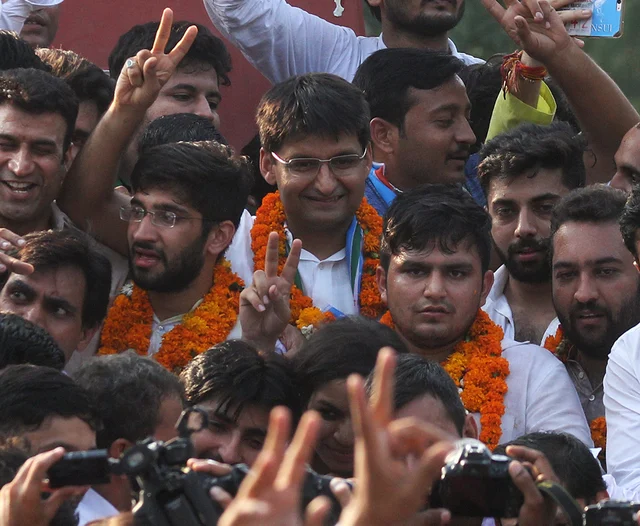 NSUI’s Rocky Tusseed and Kunal Sehrawat with Congress Lok Sabha MP Deepender Singh Hooda flash victory signs after winning the president and vice-president’s posts in DUSU 2017 elections. NSUI’s Rocky Tusseed and Kunal Sehrawat with Congress Lok Sabha MP Deepender Singh Hooda flash victory signs after winning the president and vice-president’s posts in DUSU 2017 elections.