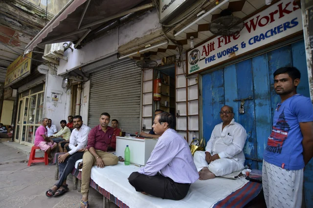 Firecracker traders sit idle outside their shops near a Jama Masjid market in Delhi on Oct 9, 2017. The Supreme Court on 9th October ruled that there will be no sale of firecrackers during Diwali, as it restored a November 2016 order banning the sale and stocking of firecrackers in Delhi and National Capital Region Firecracker traders sit idle outside their shops near a Jama Masjid market in Delhi on Oct 9, 2017. The Supreme Court on 9th October ruled that there will be no sale of firecrackers during Diwali, as it restored a November 2016 order banning the sale and stocking of firecrackers in Delhi and National Capital Region