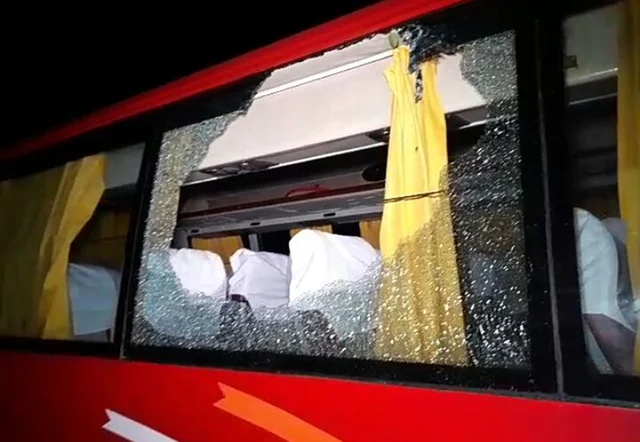A view of a damaged window of the bus which was carrying Australian cricket squad after a stone was thrown at their bus on its return to a city hotel from the Barsapara Cricket Stadium in Guwahati A view of a damaged window of the bus which was carrying Australian cricket squad after a stone was thrown at their bus on its return to a city hotel from the Barsapara Cricket Stadium in Guwahati
