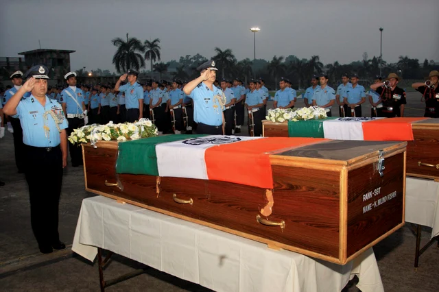 IAF officers pay homage to two Air Force commandos, Sgt Milind Kishor Khairnar and Corporal Nilesh Kumar Nayan, who died in an encounter in J&K’s Bandipora district. IAF officers pay homage to two Air Force commandos, Sgt Milind Kishor Khairnar and Corporal Nilesh Kumar Nayan, who died in an encounter in J&K’s Bandipora district.