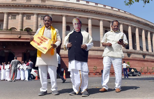TDP party leaders, wearing a mask of former Deputy Prime Minister late Sardar Vallabhbhai Patel, during a protest demanding a special status for Andhra Pradesh during Budget Session at Parliament House in New Delhi. TDP party leaders, wearing a mask of former Deputy Prime Minister late Sardar Vallabhbhai Patel, during a protest demanding a special status for Andhra Pradesh during Budget Session at Parliament House in New Delhi.
