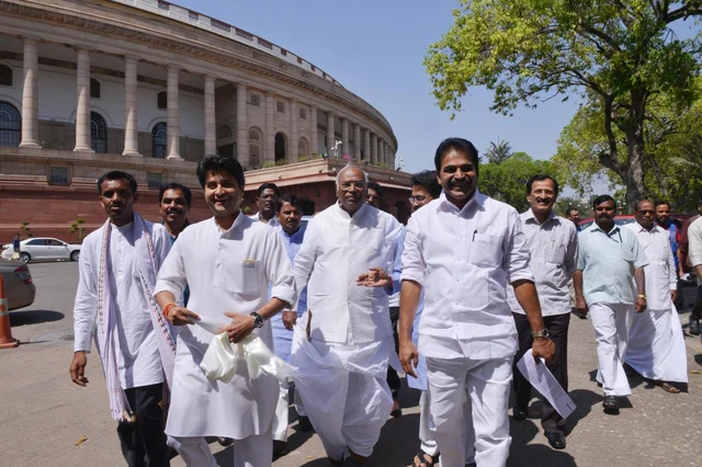 Congress MPs Mallikarjun Kharge, Jyotiraditya Scindia, K. C. Venugopal and others at Parliament in New Delhi. Also seen Congress MP Jyotiraditya Scindia. Congress MPs Mallikarjun Kharge, Jyotiraditya Scindia, K. C. Venugopal and others at Parliament in New Delhi. Also seen Congress MP Jyotiraditya Scindia.