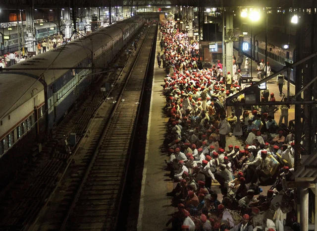 Farmers wait on a railway platform to return to Nashik after a Kisan Sabha rally, in Mumbai on late Monday. A speciall train had been arranged to take the farmers back home, as government agreed to fulfill most of their demands. Farmers wait on a railway platform to return to Nashik after a Kisan Sabha rally, in Mumbai on late Monday. A speciall train had been arranged to take the farmers back home, as government agreed to fulfill most of their demands.