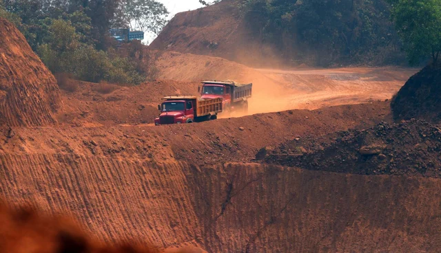 A view of trucks moving amid mine fields near an iron plant at Navelim in Goa. BJP Goa MPs met the party’s national president Amit Shah in the New Delhi on Tuesday and discussed the Supreme Court-imposed mining ban in Goa which is slated to come into effect from March 15. A view of trucks moving amid mine fields near an iron plant at Navelim in Goa. BJP Goa MPs met the party’s national president Amit Shah in the New Delhi on Tuesday and discussed the Supreme Court-imposed mining ban in Goa which is slated to come into effect from March 15.