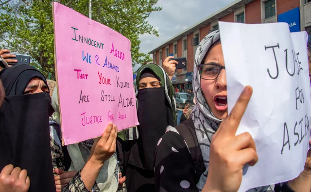 Students hold placards and shout slogans during a protest against the rape and murder of a 8-year-old girl in Kathua, in Srinagar. Students hold placards and shout slogans during a protest against the rape and murder of a 8-year-old girl in Kathua, in Srinagar.