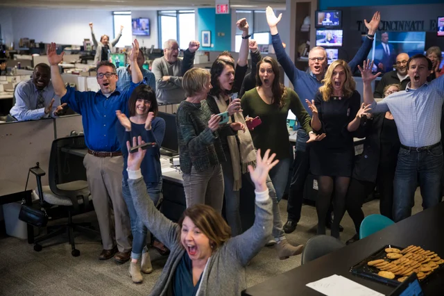 Cincinnati Enquirer reporter Amber Hunt, foreground, and other Enquirer staff celebrate. in Cincinnati, as they learn the newspaper won the Pulitzer Prize for Local Reporting for “Seven Days of Heroin,” a week-long examination of the many ways the heroin crisis is impacting their community. Cincinnati Enquirer reporter Amber Hunt, foreground, and other Enquirer staff celebrate. in Cincinnati, as they learn the newspaper won the Pulitzer Prize for Local Reporting for “Seven Days of Heroin,” a week-long examination of the many ways the heroin crisis is impacting their community. 