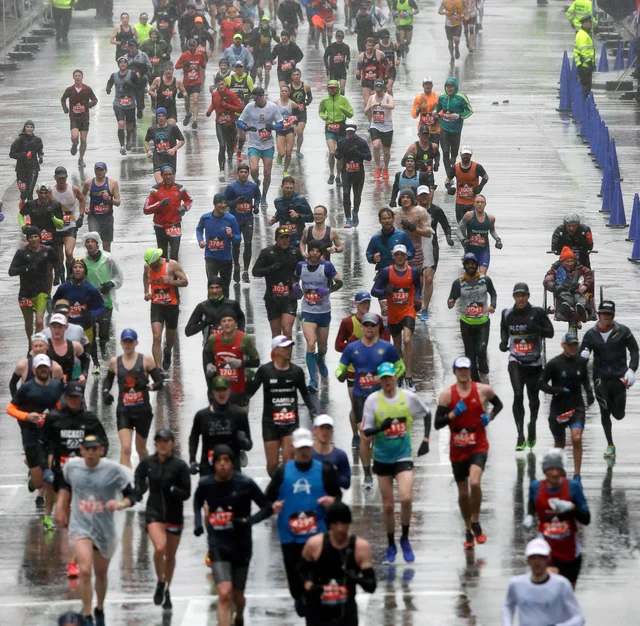 Runners approach the finish line during the 122nd Boston Marathon Runners approach the finish line during the 122nd Boston Marathon