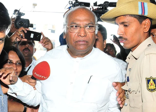 Congress leader Mallikarjun Kharge comes out of Raj Bhavan after attending the legislature party meeting in Bengaluru. Congress leader Mallikarjun Kharge comes out of Raj Bhavan after attending the legislature party meeting in Bengaluru.
