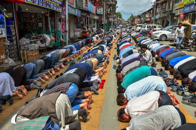 Muslims offer prayers on the first day of Ramzan at Budshah Chowk in Srinagar. Muslims offer prayers on the first day of Ramzan at Budshah Chowk in Srinagar. 