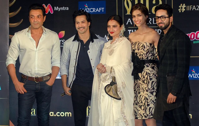 Bollywood actors Rekha, Varun Dhawan, Bobby Deol, Kriti Sanon and Ayushmann Khurrana during an announcement of the 19th edition of IIFA Awards 2018 Thailand, in Mumbai. Bollywood actors Rekha, Varun Dhawan, Bobby Deol, Kriti Sanon and Ayushmann Khurrana during an announcement of the 19th edition of IIFA Awards 2018 Thailand, in Mumbai.
