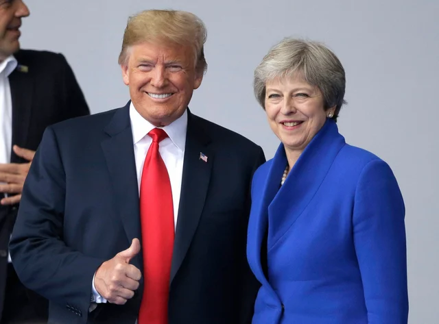 US President Donald Trump, left, with British Prime Minister Theresa May during a summit of heads of state and government at NATO headquarters in Brussels. US President Donald Trump, left, with British Prime Minister Theresa May during a summit of heads of state and government at NATO headquarters in Brussels.