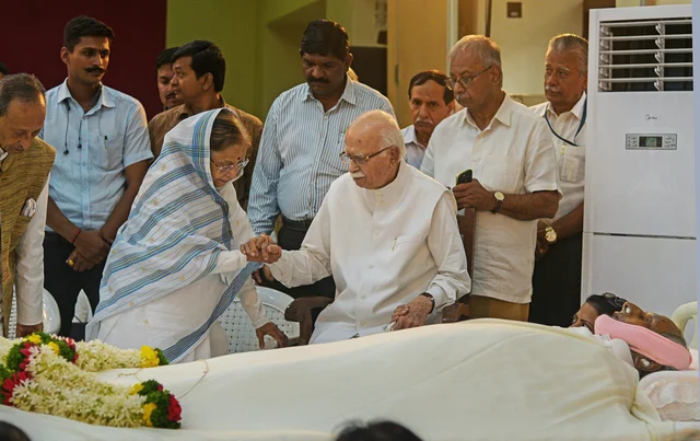 Former President Pratibha Patil and senior Bharatiya Janata Party leader L K Advani pay their last respects to spiritual leader Dada J P Vaswani, in Pune. Former President Pratibha Patil and senior Bharatiya Janata Party leader L K Advani pay their last respects to spiritual leader Dada J P Vaswani, in Pune.