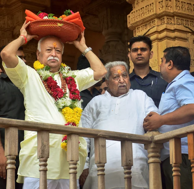 RSS chief Mohan Bhagwat and former BJP leader Keshubhai Patel before performing prayers at Somnath Temple in Gujarat. RSS chief Mohan Bhagwat and former BJP leader Keshubhai Patel before performing prayers at Somnath Temple in Gujarat.