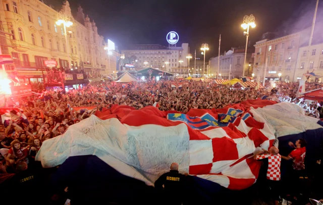 Croatia fans celebrate at the end of the semifinal match between Croatia and England, in Zagreb, Croatia. Croatia fans celebrate at the end of the semifinal match between Croatia and England, in Zagreb, Croatia.