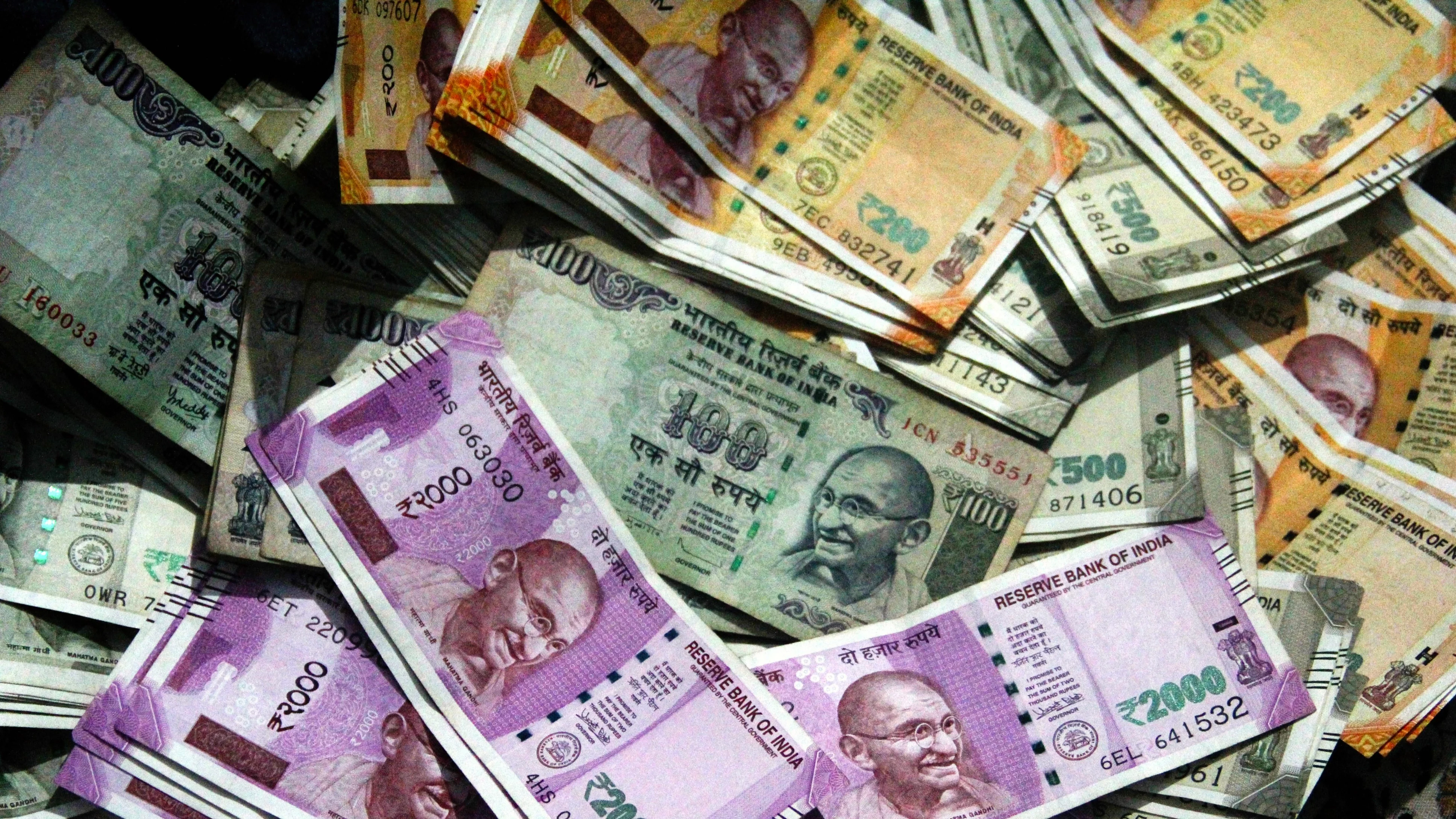 Rupee settles flat at 87.50 against USD after inching close to 88-level in  intra-day trade