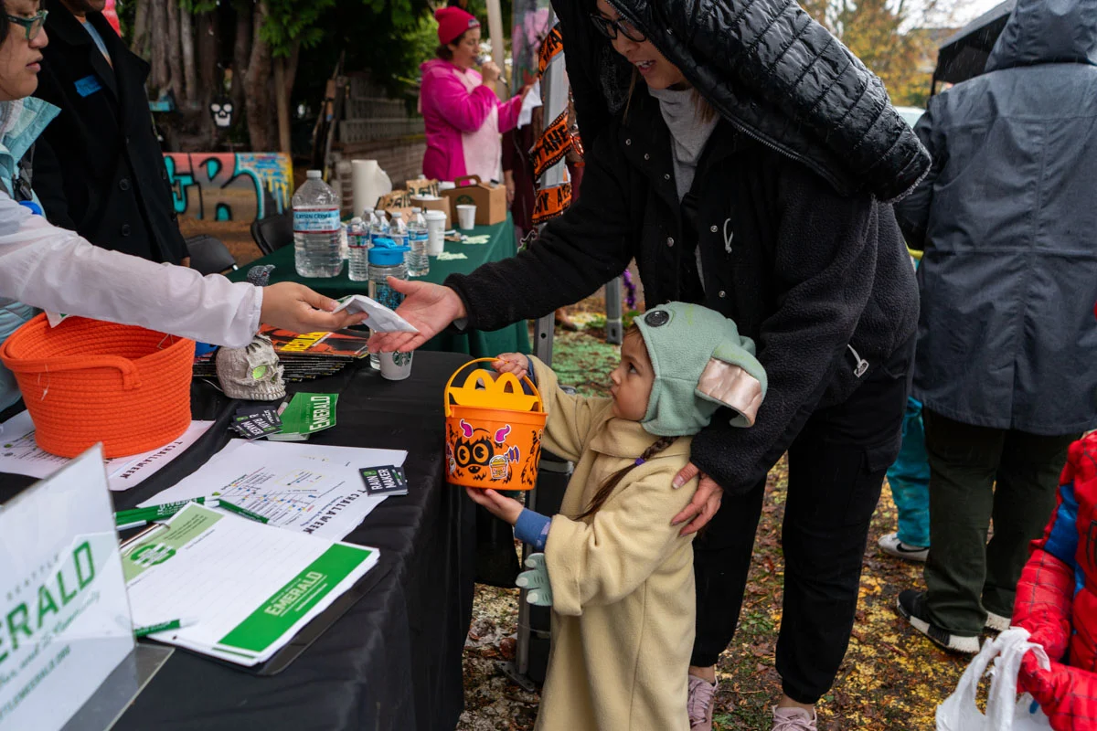 Volunteers pass out candy to children and adults during the fifth annual T'Challaween in 2024. Photo by Susan Fried.