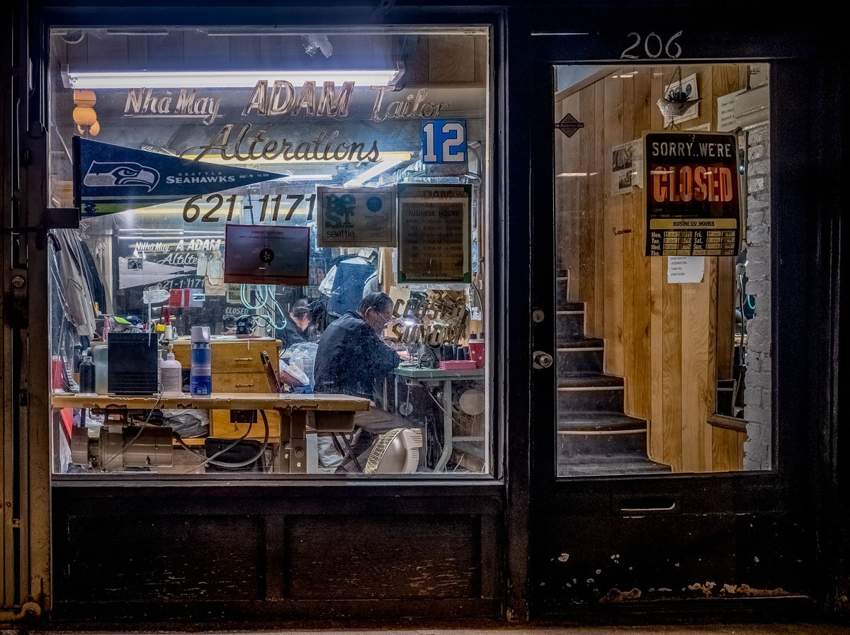 Be Van Nguyen works at Pioneer Square tailor shop.