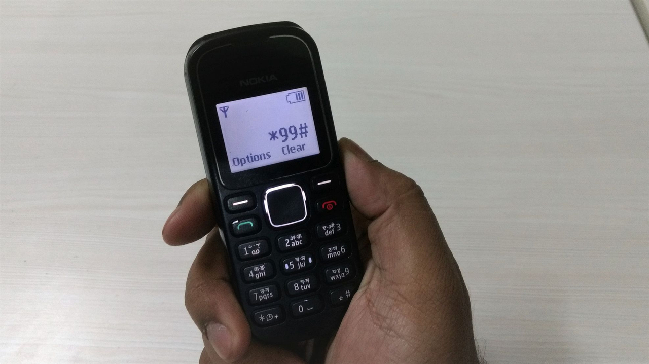 A user dialing *99# to access NUUP. Image: Srikanth Ramakrishnan/Swarajya