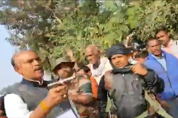 Image result for Candidate candidate with gun on polling station!