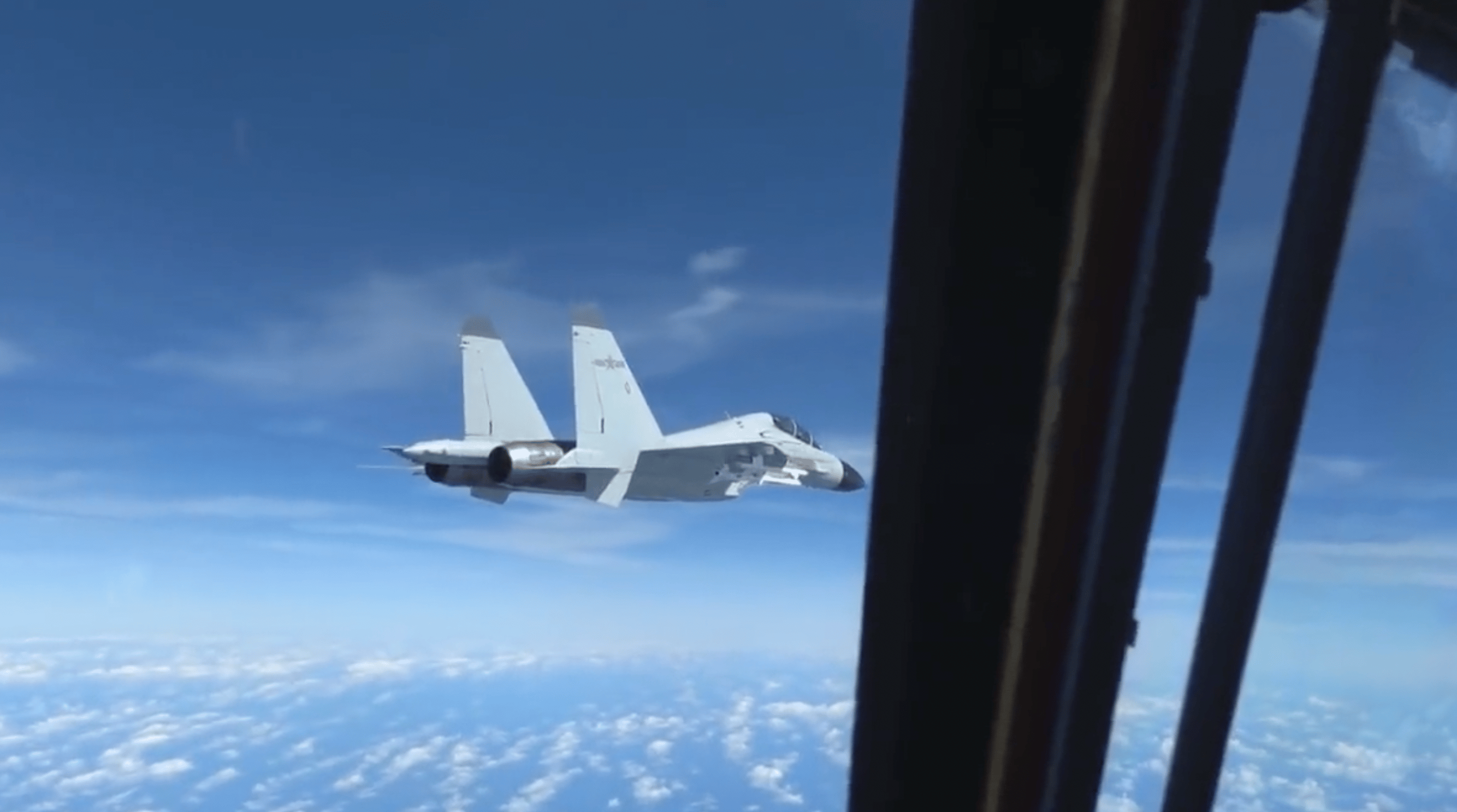Footage of December 21 Incident Between Chinese J-11 and American RC-135 Released