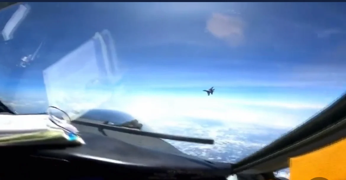 Chinese Fighter Brazenly Cuts of U.S. RC-135 Rivet Joint Over Pacific