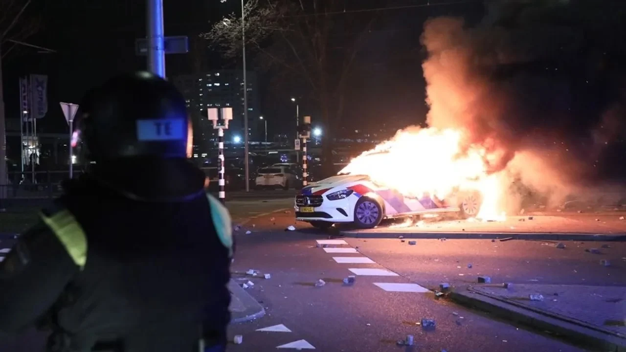 Rival Eritrean Migrants Clash, Torch Police Cars in The Hague, Netherlands