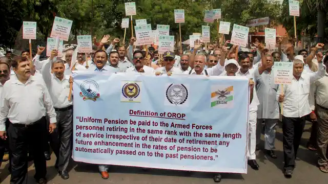 Ex-servicemen of Gujarat protest to demand “One Rank One Pension” in Ahmedabad on Sunday. (Photo: PTI)