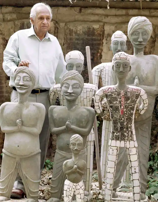 <!--StartFragment-->Nek Chand stands among idols in his Rock Garden (Photo Courtesy: Nekchand.com)<!--EndFragment-->