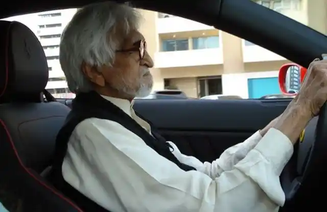 MF Husain driving his Ferrari. (Photo Courtesy: Sahar Zaman)