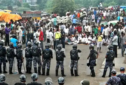 Nepal’s border districts had for months witnessed low-level violence by the Madhesi community when the draft Constitution was being debated, and hours after it was passed on September 20, violence escalated. (Photo: AP) 