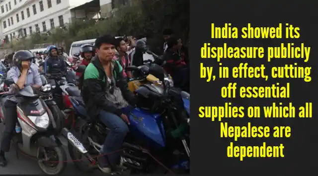 Nepalese motorists wait for their turn to tank up their motorbikes at a fuel station run by the Nepalese army in Kathmandu. (Photo: AP)