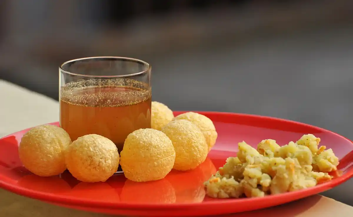 The pani puri with black grape juice was turned into a trend thanks to Sanjeev Kapoor’s genius. (Photo Courtesy: <a href="https://pixabay.com/en/photos/nutrients/">pixabay.com</a>)” data-reactid=”277″><figcaption class=