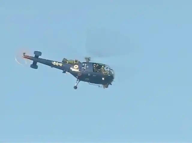 Indian Navy’s Chetak helicopter searching for missing student. (Photo Courtesy: ANI)