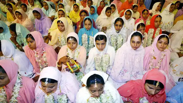 Women of the Dawoodi Bohra Muslim sect during a mass marriage function in Mumbai. The Dawoodi Bohra sect still carries out female genital mutilation (Photo: Reuters)