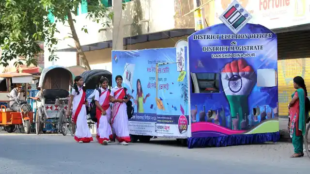 An Election Commission campaign vehicle urges the voters to exercise their voting rights at Balurghat in South Dinajpur district of West Bengal on April 8, 2016. (Photo: IANS)