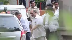 Virendra S Tawade being taken away after being produced before the Sessions Court for alleged involvement in the murder of Narendra Dabholkar. (Photo: IANS)