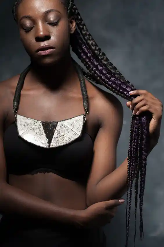 African woman with long braided hair. (Photo: iStockphoto)