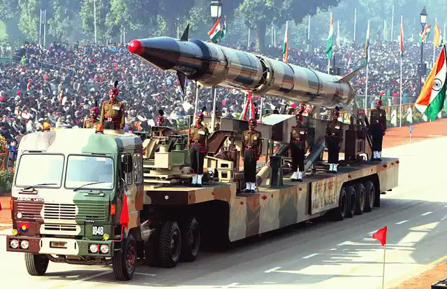 Agni-II intermediate range ballistic missile on a road-mobile launcher (Photo Courtesy: Wikimedia <a href="https://en.wikipedia.org/wiki/Agni_(missile)#/media/File:Agni-II_missile_(Republic_Day_Parade_2004).jpeg">Creative Commons</a>)